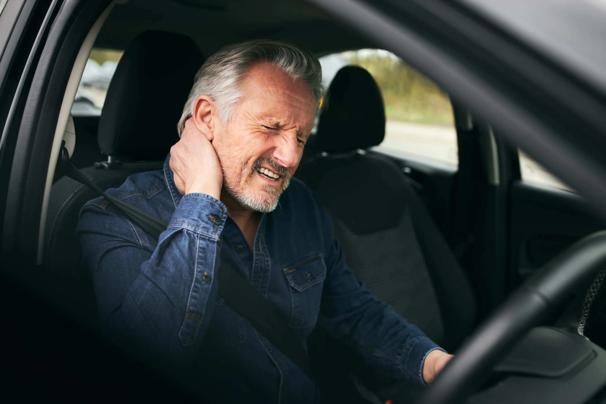 I Person Having Neck Pain Due To Long Car Drive Read These Three Tips for Long Car Rides