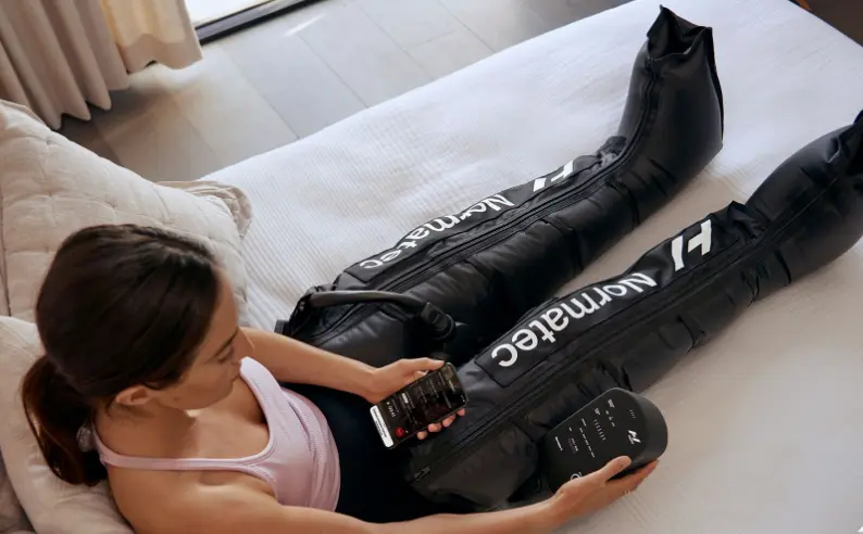 Normatec compression therapy for pain relief. Rehab treatment at our physical therapy clinic improves mobility and recovery