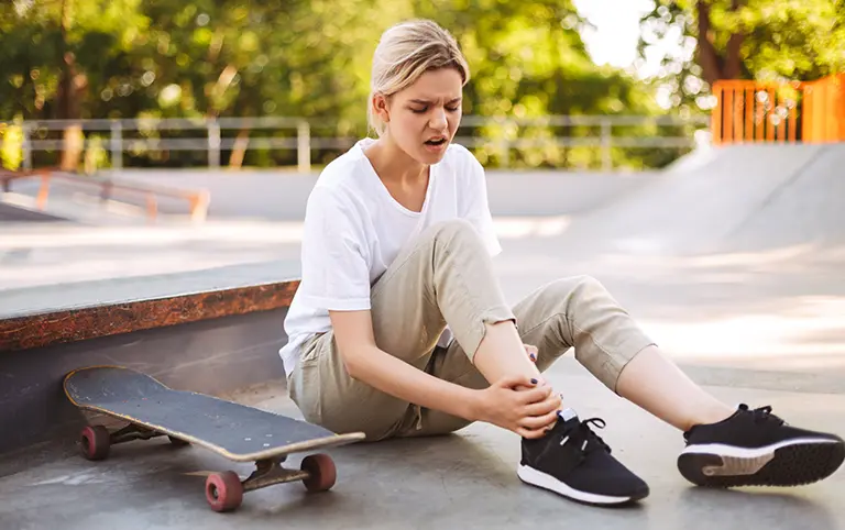 Foot ankle pain: Work injury rehab patient receiving physical therapy for pain relief and mobility recovery