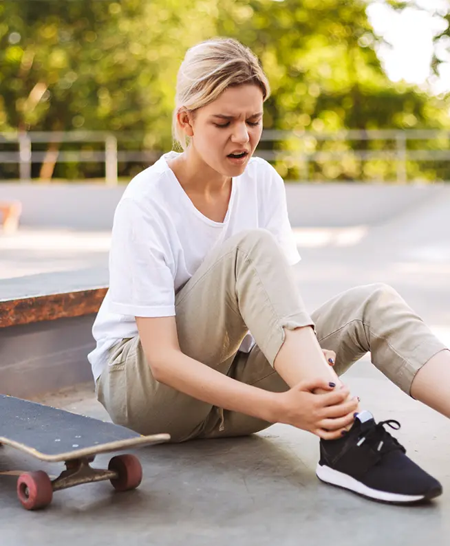 Foot ankle pain: Work injury rehab patient receiving physical therapy for pain relief and mobility recovery