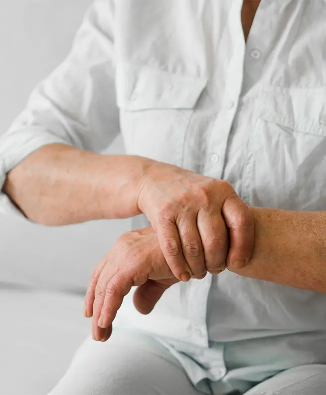 Hand wrist pain treatment: Rehab clinic patient seeks pain relief and mobility recovery after work injury. Physical therapy improves function.